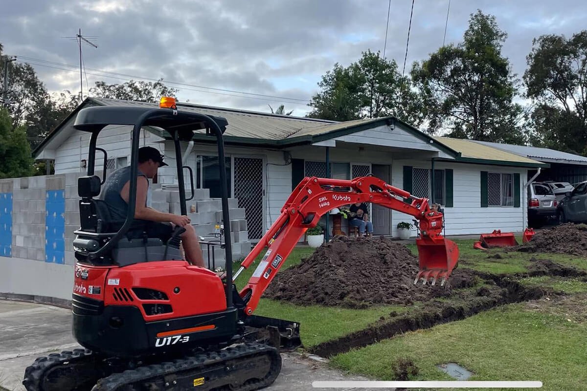Excavation machinery preparing footings